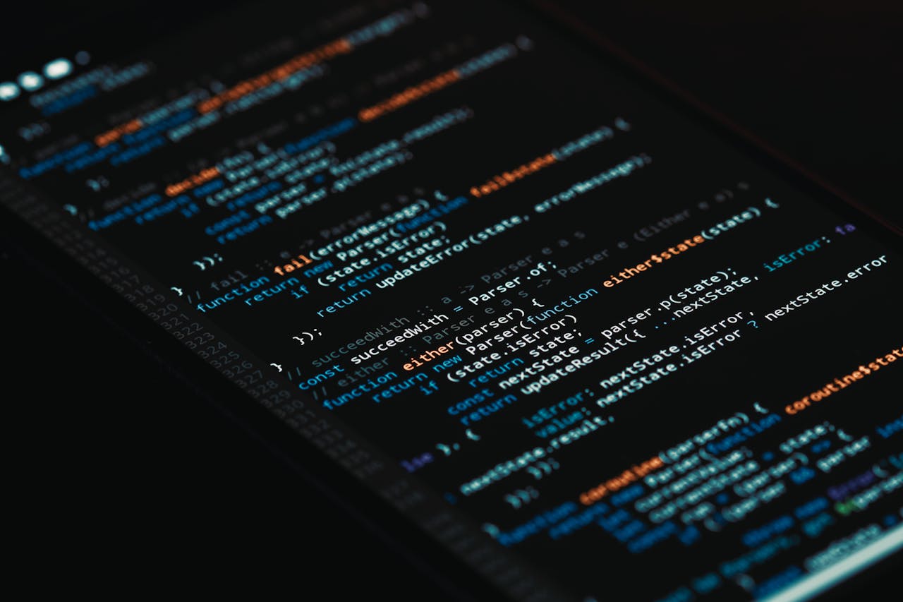 A detailed view of computer programming code on a screen, showcasing software development.